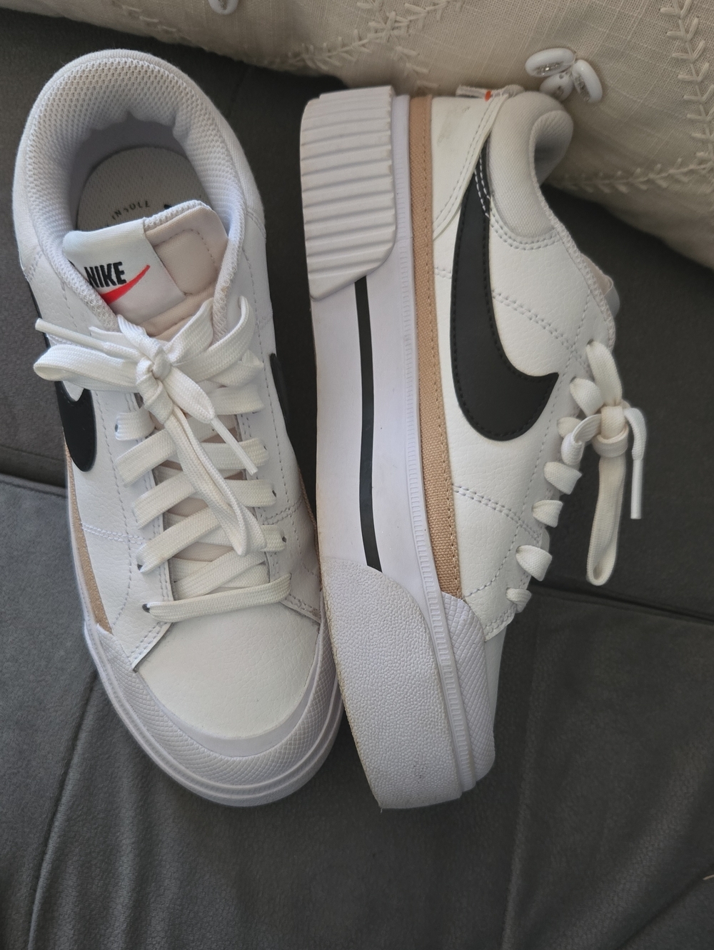 Nike Women’s White Sneakers with Black Swoosh and Tan Accent